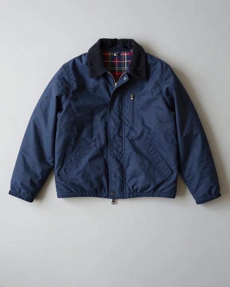 Vintage navy Polo Ralph Lauren jacket with tartan lining, a thrift store find