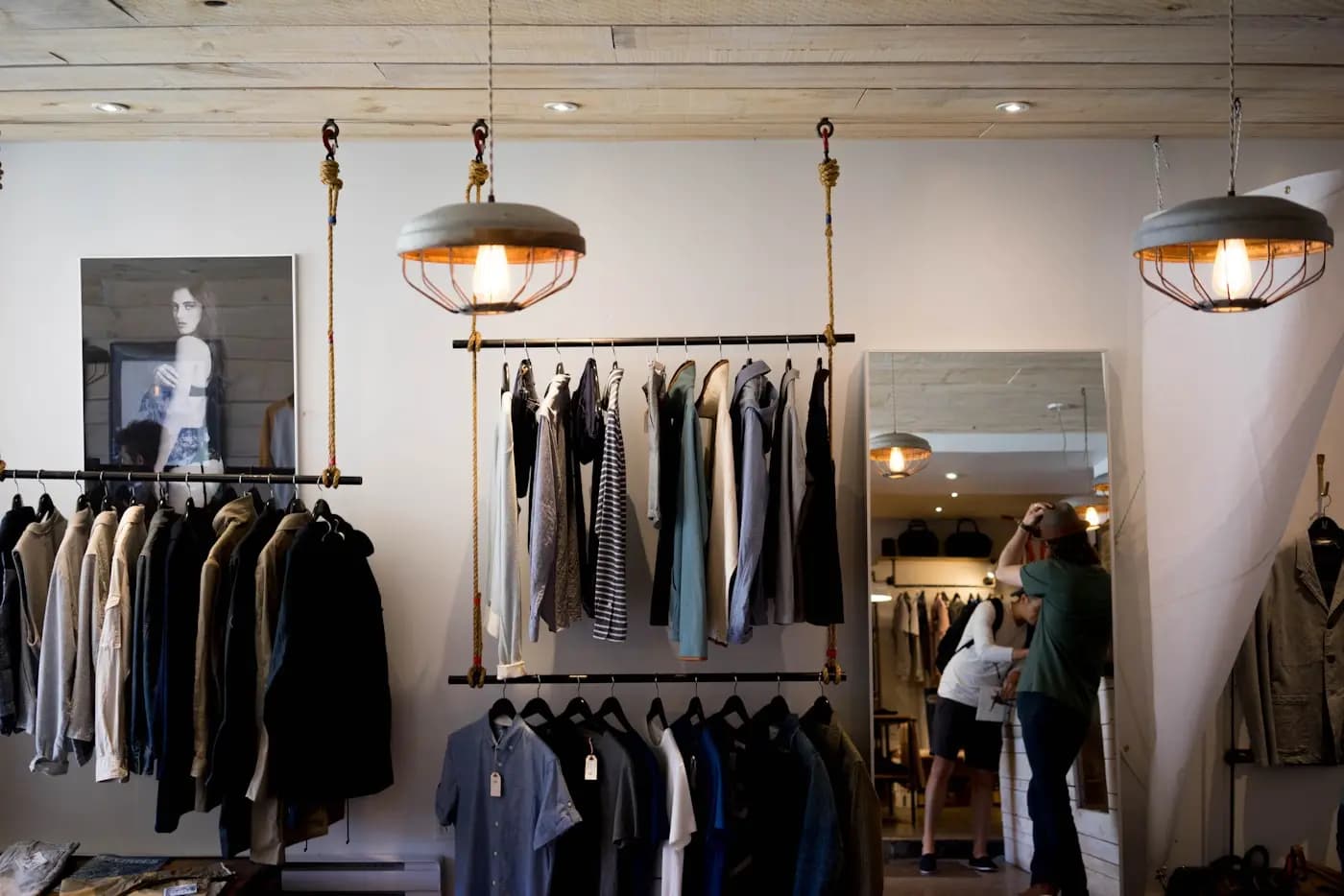 Thrift store clothing racks with vintage fashion items